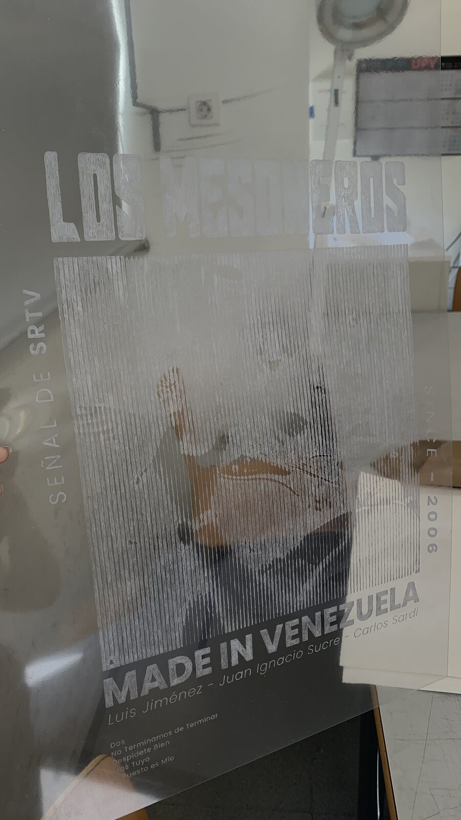 The acetate plate next to a first proof print